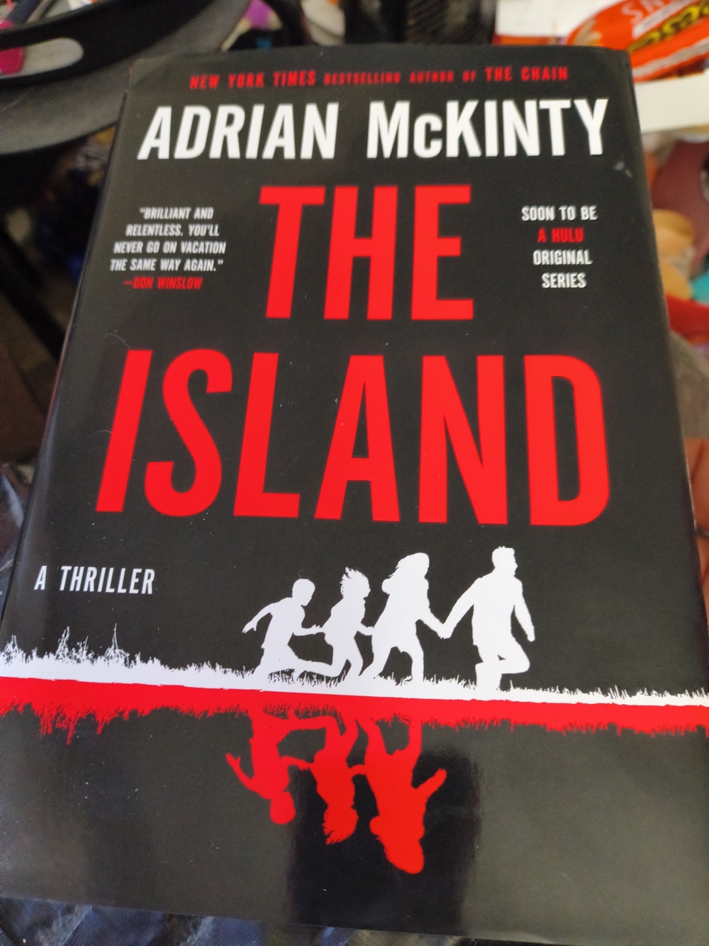 - The Island (Black and Red Thriller Paperback)